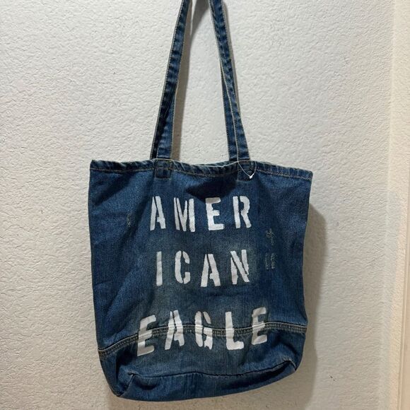 American Eagle Outfitters Handbags - AMERICAN EAGLE Outfitters distressed denim tote bag NWOT